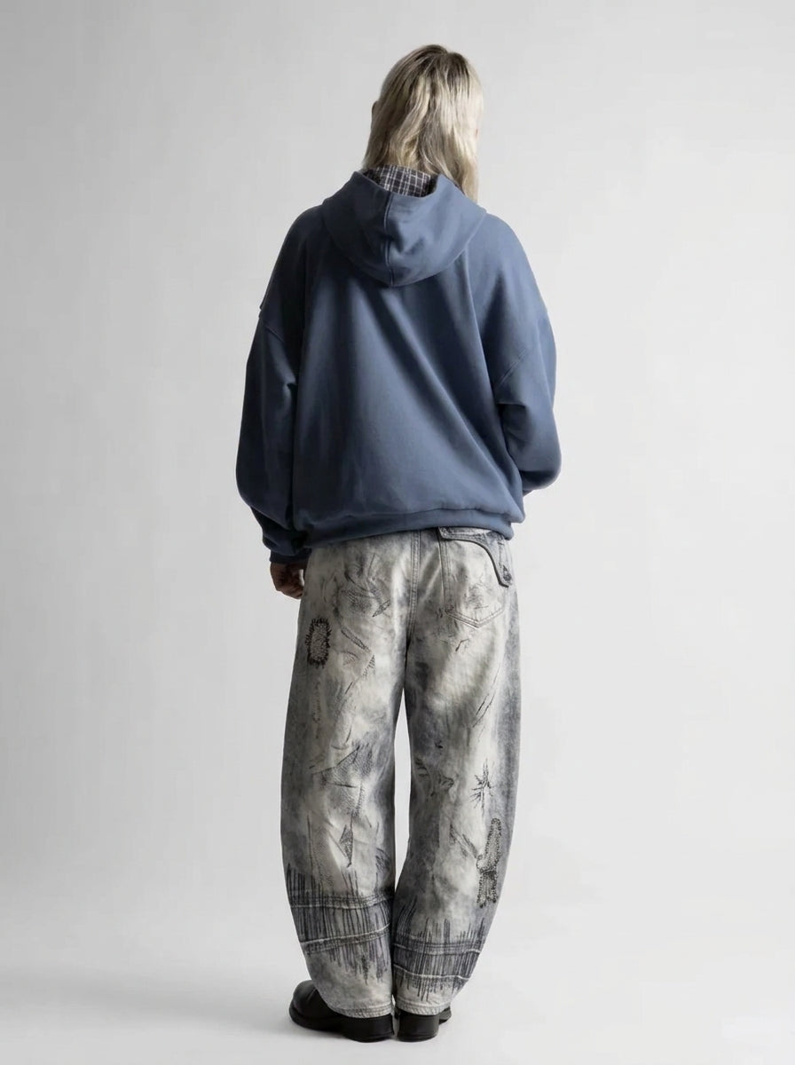 Glitch Fade Printed Baggy Jeans in Light Blue Wash