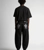 Grave Skeleton Pocket Baggy Jeans in Black Wash