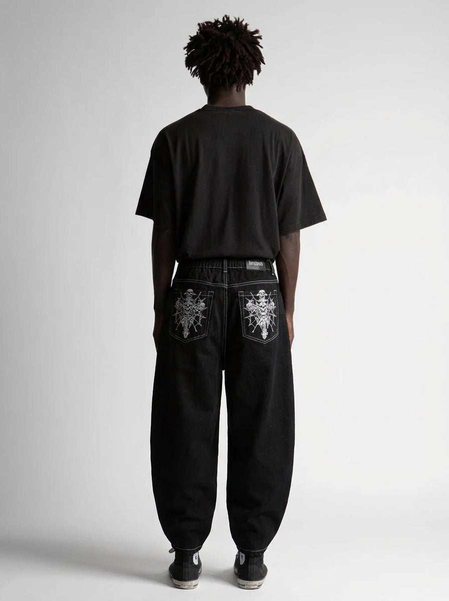 Grave Skeleton Pocket Baggy Jeans in Black Wash