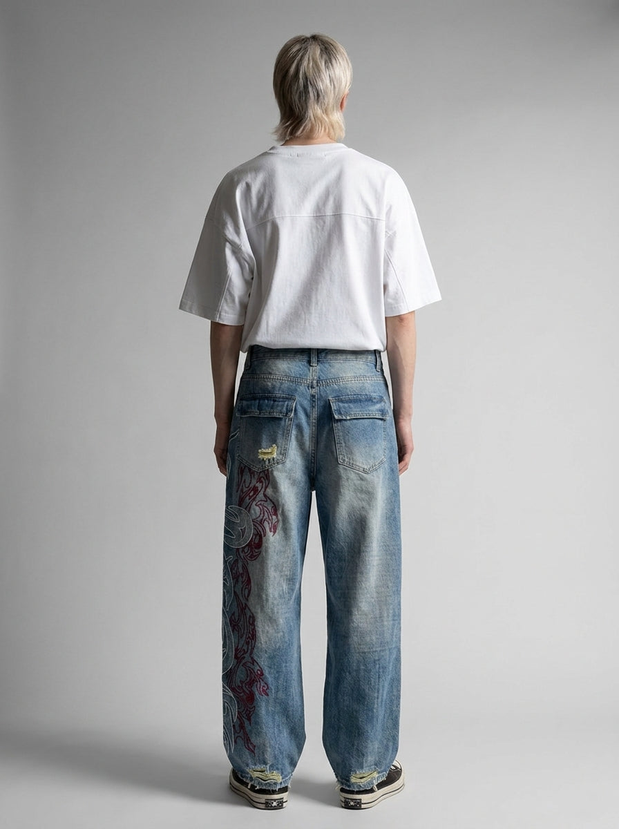 Inferno Tribal Embroidered Baggy Jeans in Washed Blue