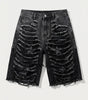 Riot Frayed Raw Edge Distressed Denim Shorts in Washed Black