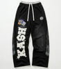 Riot "KASH" Star Print Wide Leg Sweatpants in Black