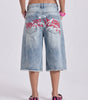Riot Tag Graffiti Baggy Denim Jorts in Light Wash