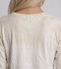 Fallen Scholar Distressed Text Graphic Long Sleeve Top in Washed Cream