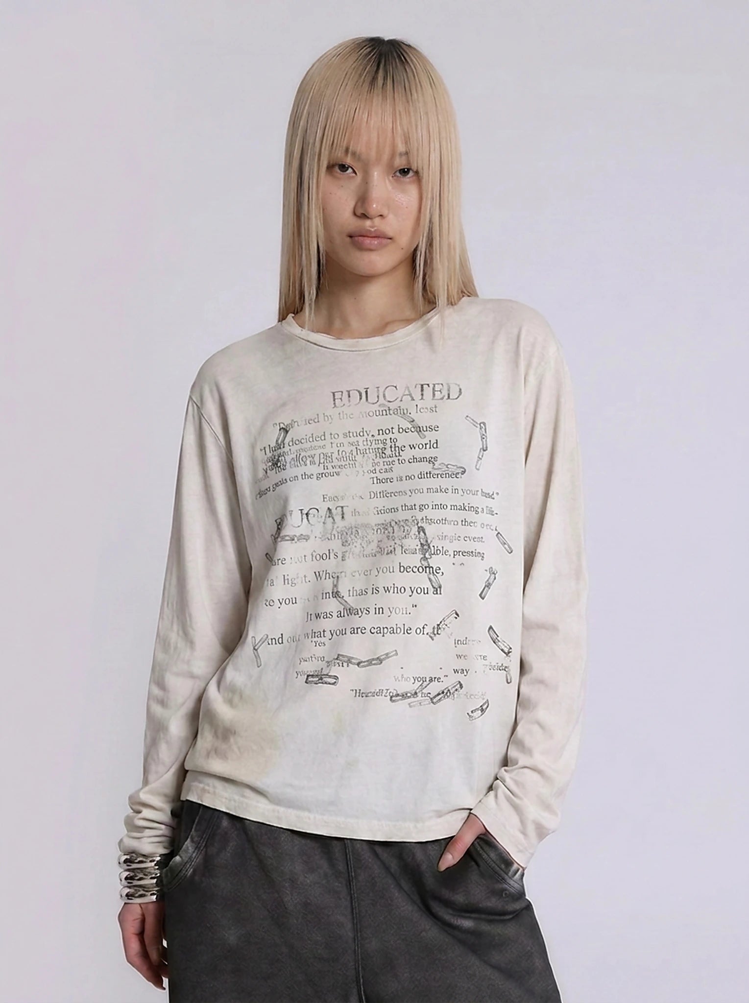 Fallen Scholar Distressed Text Graphic Long Sleeve Top in Washed Cream