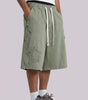 Star Patch Baggy Drawstring Shorts in Washed Olive